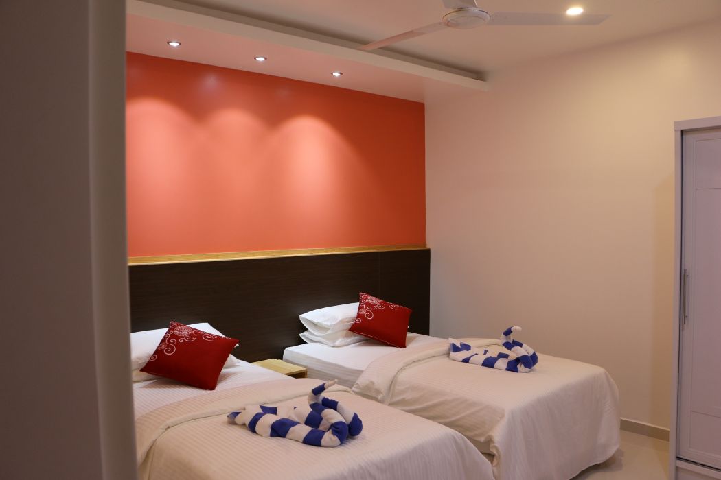 Spacious family room with multiple beds